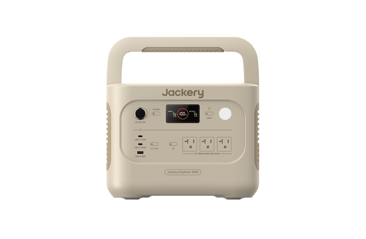 Jackery Explorer 1000v2 portable power station in Dune White with multiple ports and digital display, used for portable power supply.