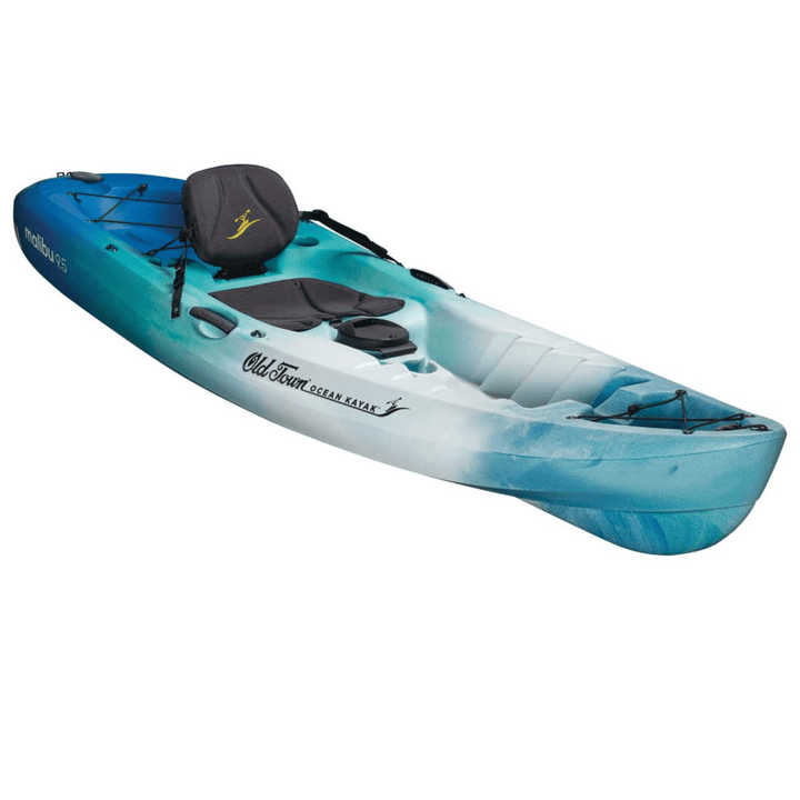 Meyer Old Town Ocean Paddle Kayak Malibu 9 ft 5 in sit-on-top recreational kayak on calm water, featuring blue and white design.