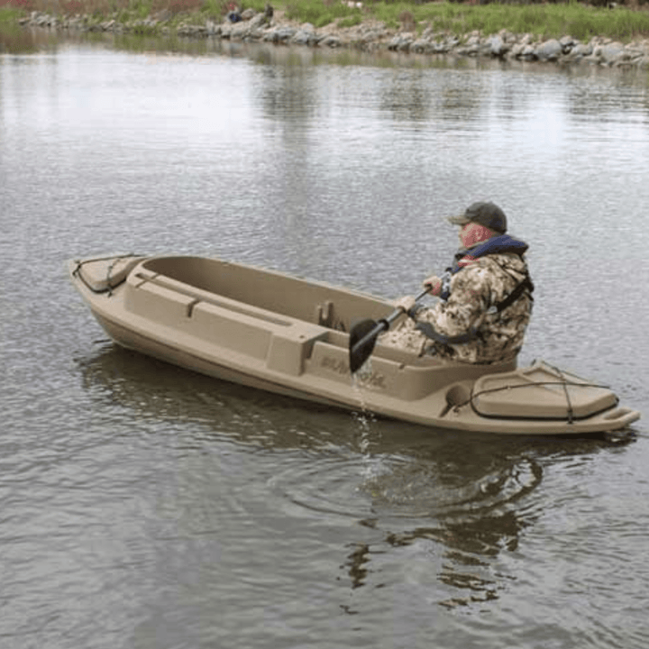 Meyer Beavertail Stealth 1200 sit-inside kayak in marsh brown with catamaran-style hull, 12 ft long, shown from side view.