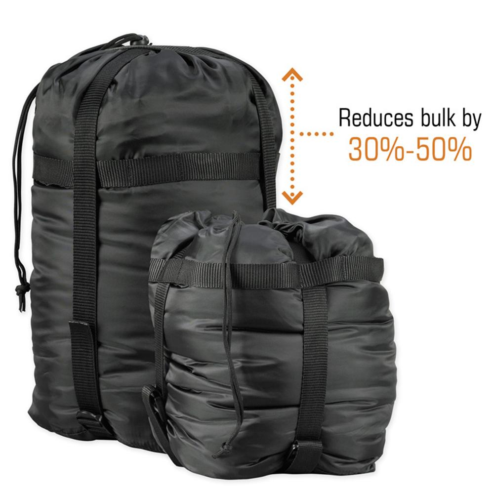 Medium olive Snugpak compression stuff sack by Chattanooga for durable gear storage, shown in a compact, rolled-up form.