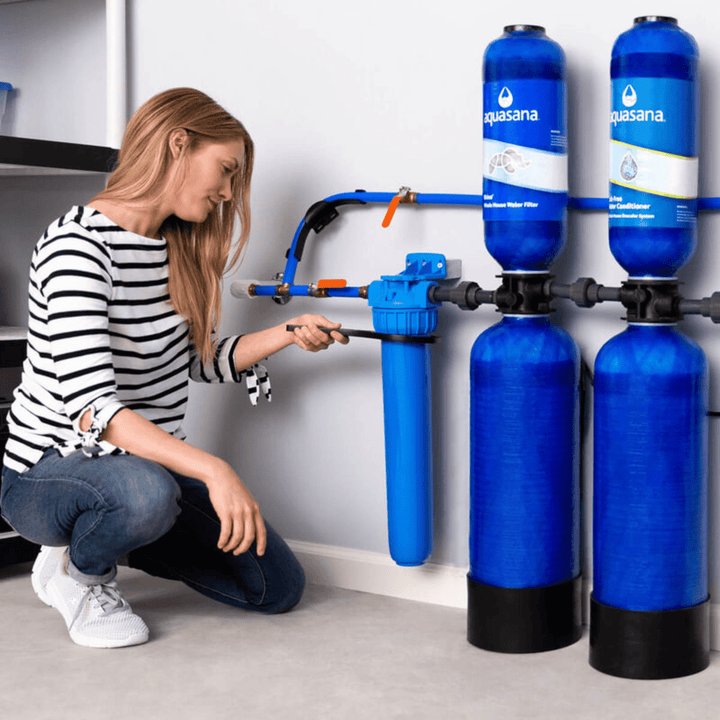 Aquasana City Water Whole House Filter System with UV, pre- and post-filters, and installation kit for clean, filtered home water.