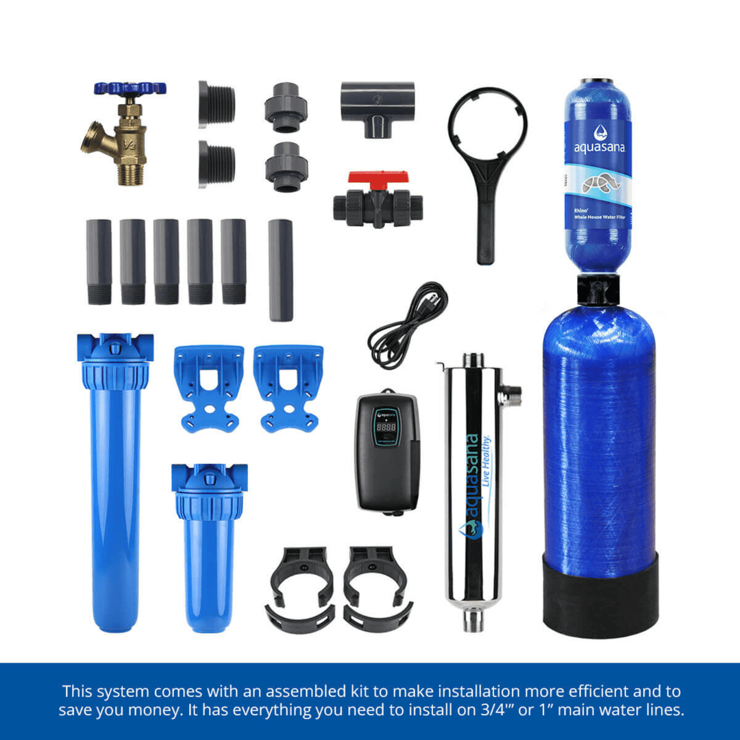 Aquasana Well Whole House Filtration system with UV light, salt-free conditioner, and pro-grade kit installed in a home plumbing setup.
