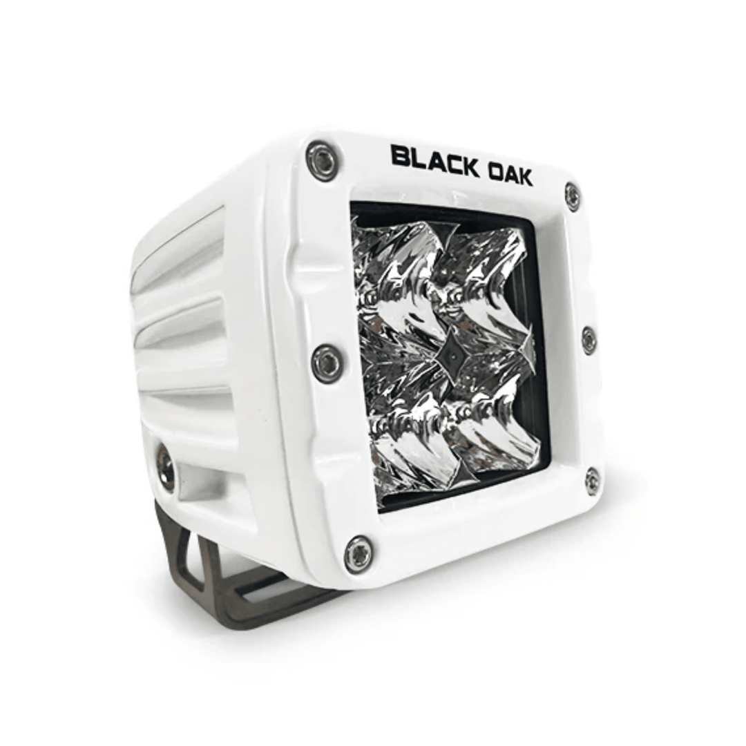 Black Oak LED 2-inch marine pod light with flood optics, white housing, 10-watt Cree LED for outdoor marine lighting.