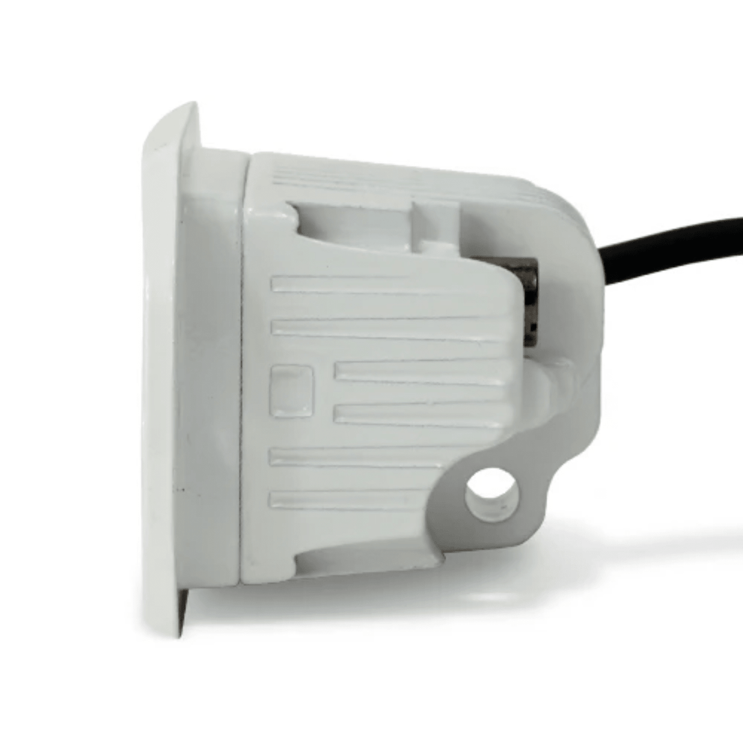 Black Oak LED 2-inch marine flush mount spreader light with white housing, ideal for boat lighting and waterproof applications.
