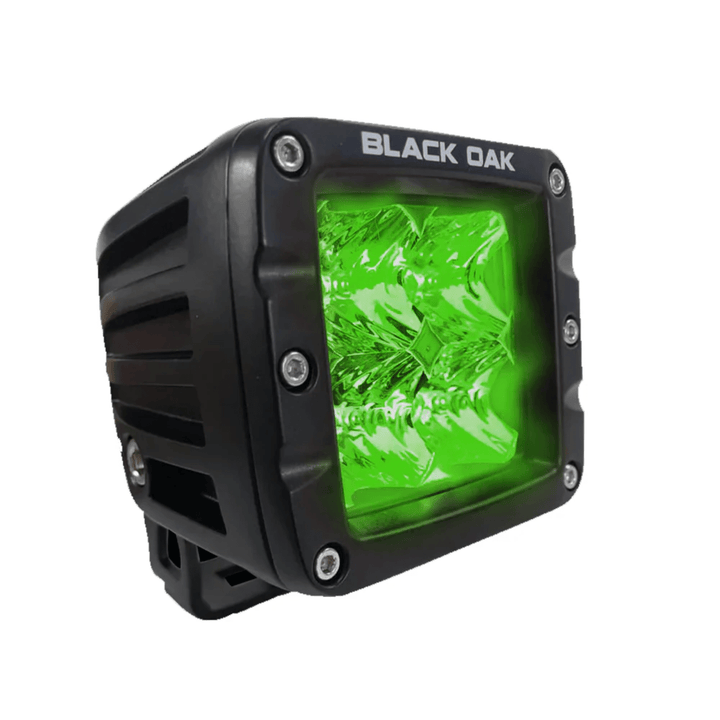 Black Oak LED 2-inch green hog pod light with flood optics, black finish, designed for efficient LED lighting applications.