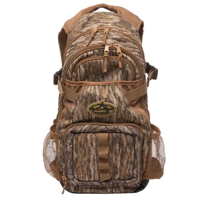 Chattanooga Rig Em Right Outdoors Stump Jumper backpack in Mossy Oak Bottomland camo with multiple compartments and padded straps.