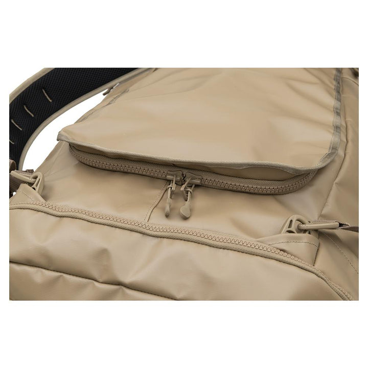 Chattanooga Alps Outdoors Refuge 40L tan duffel bag with durable fabric and carry handles for travel and gear storage.