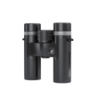 German Precision Optics Passion SD 10x26 binoculars in black and silver, compact optical device with adjustable eyepieces.