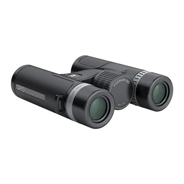 Chattanooga German Precision Optics Passion SD Binoculars 10x34 in black and silver two-tone, featuring compact design and high magnification.