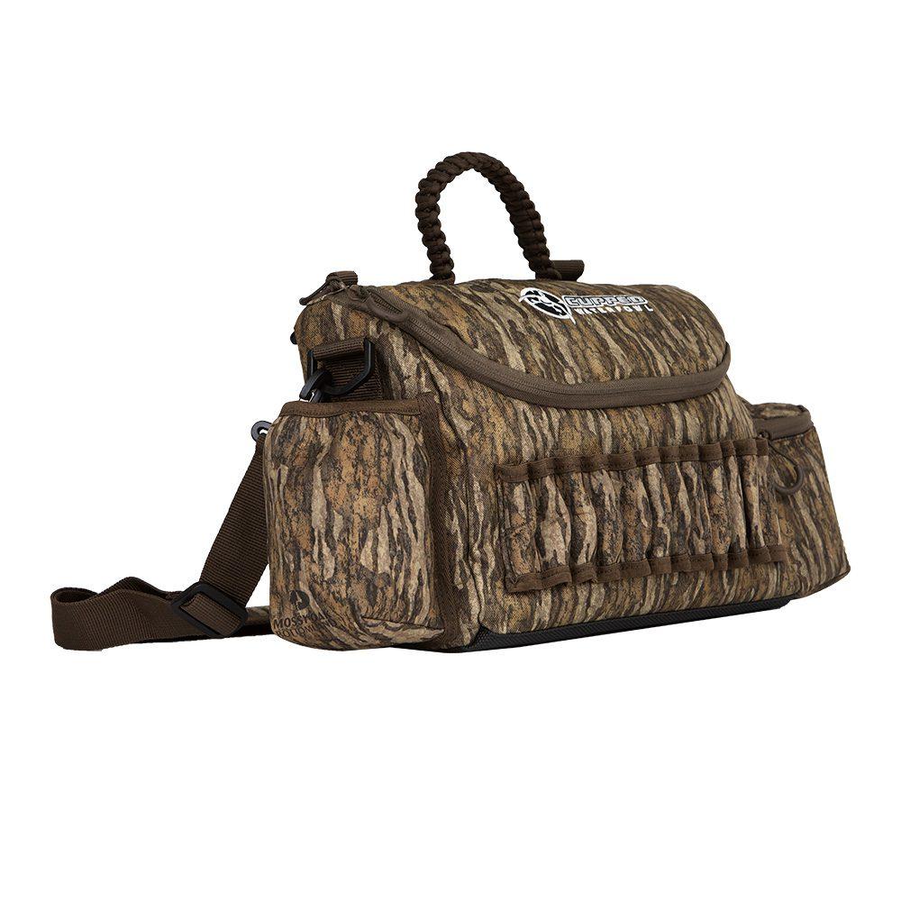 Chattanooga Cupped Guide Bag in Mossy Oak Bottomland camouflage for durable outdoor gear storage and carrying.