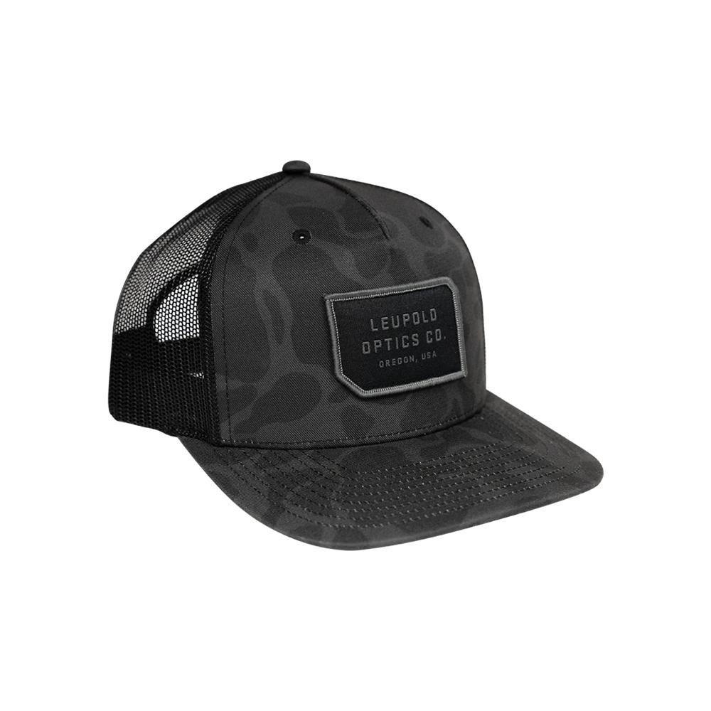 Leupold duck camo trucker cap by Chattanooga, black adjustable hat with camouflage pattern, breathable mesh back, and curved brim.