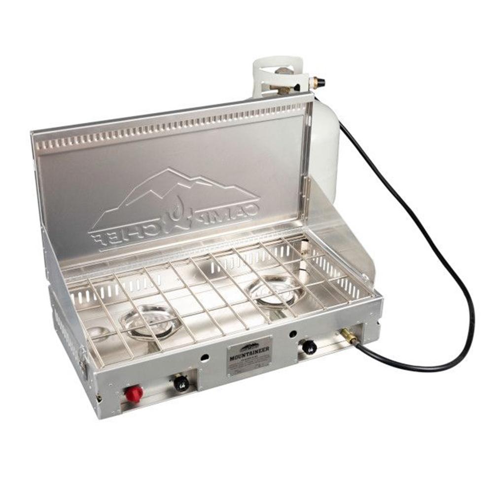 Chattanooga Camp Chef Mountaineer aluminum two-burner portable outdoor cooking system with sturdy surface and compact design.