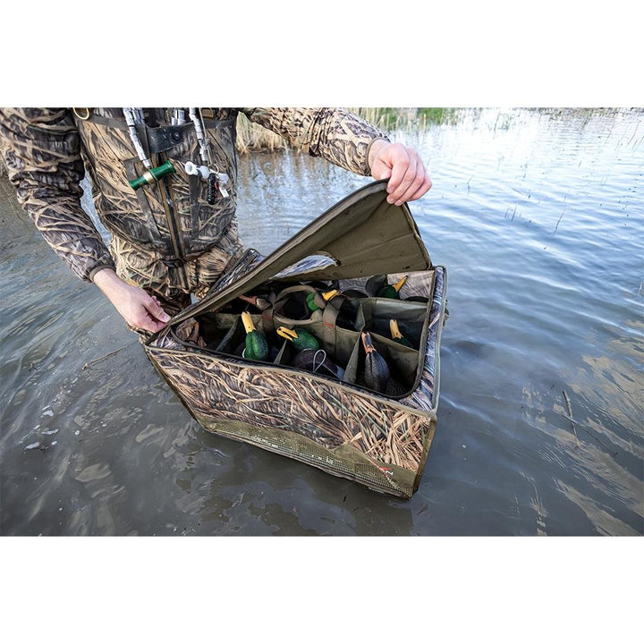 Chattanooga AvianX Floating Slotted Decoy Bag with 12 slots in Mossy Oak Shadow Grass camouflage for outdoor hunting gear.