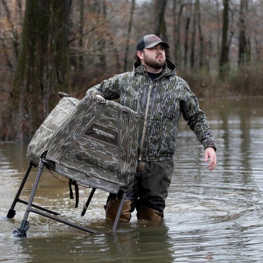 Chattanooga Higdon Outdoors Invisilab dog blind in Mossy Oak Bottomland camouflage, portable shelter for hunting or outdoor use.