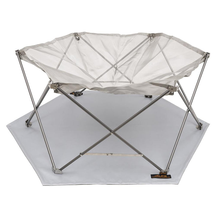 Chattanooga Alps Mountaineering Gaze Pit portable firepit with lightweight stainless steel mesh design for outdoor heating and ambiance.