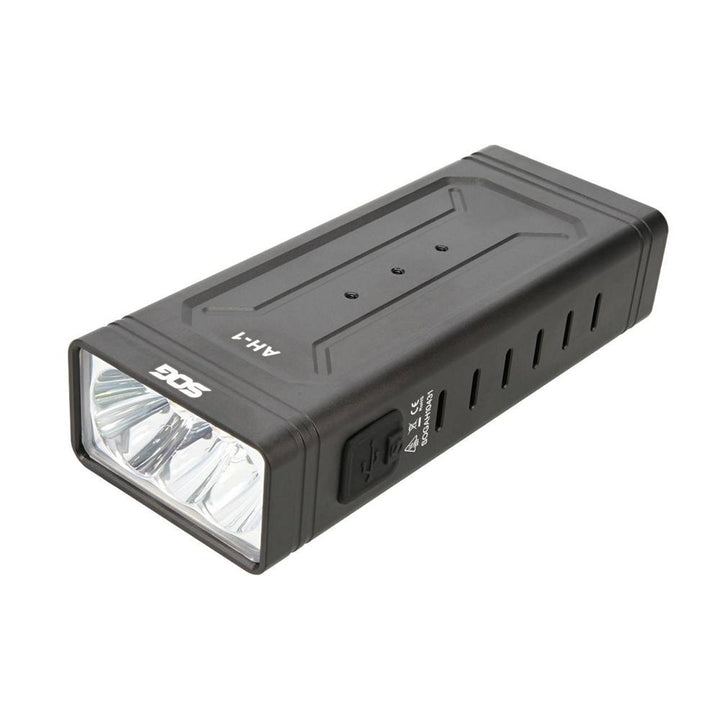 Black Chattanooga SOG Knives M113 flashlight with 4000 lumens, rechargeable outdoor light, durable and powerful for outdoor use.