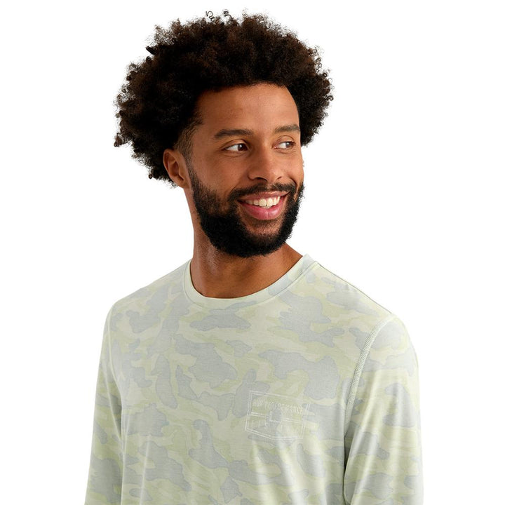 Chattanooga Huk Drift printed long sleeve crew shirt in pale algae, lightweight performance fabric, size small, with a stylish design.