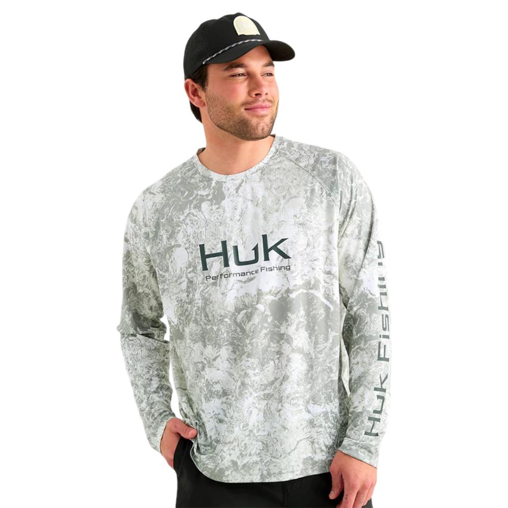 Chattanooga HUK Pursuit Mossy Oak printed long sleeve crew shirt in seagrass lightweight fabric, featuring camouflage design.