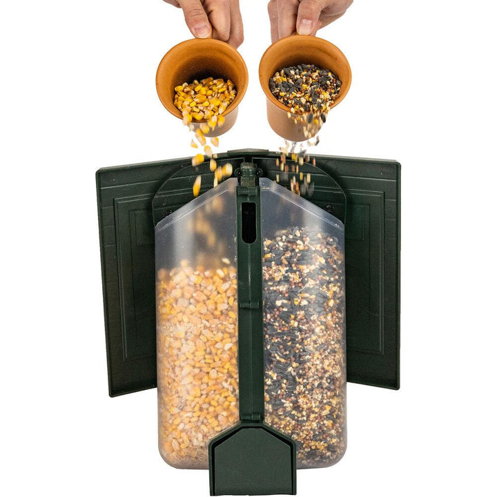 Chattanooga Tactacam FeatherSnap Scout Seed Bird Feeder outdoors, weather-resistant, designed for bird observation and feeding.