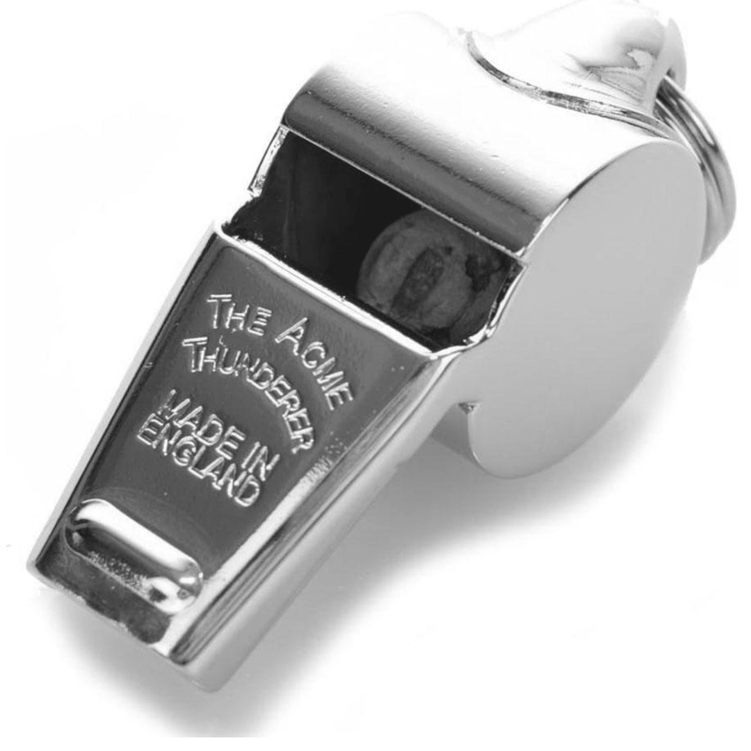 Chattanooga Omnipet Acme 59.5 Thunderer solid brass sport whistle with medium pitch and 114 dBA sound level, shown in close-up.