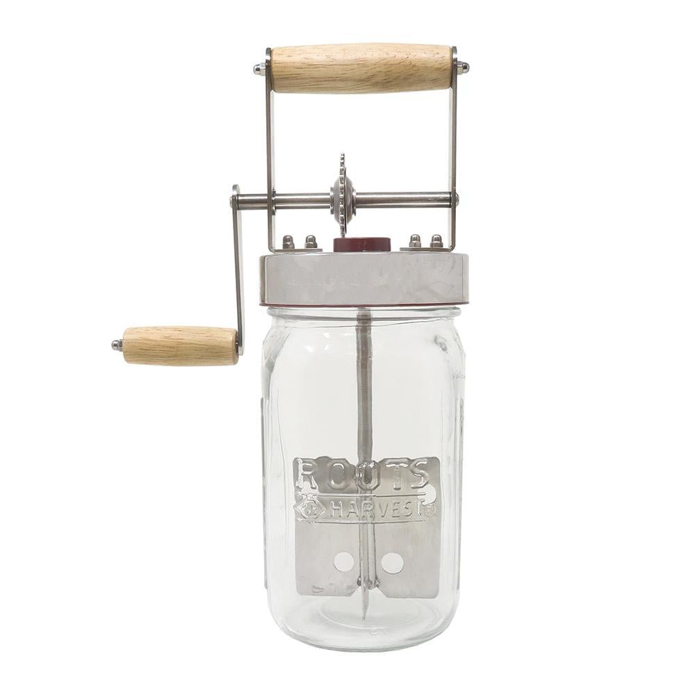 Chattanooga LEM Products butter churner glass jar with handle for making homemade creamy butter and utensils.