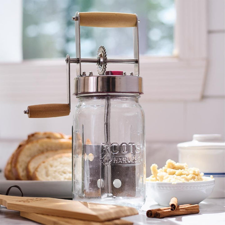 Chattanooga LEM Products glass jar butter churner with handle for making homemade creamy butter, utensil for dairy processing.