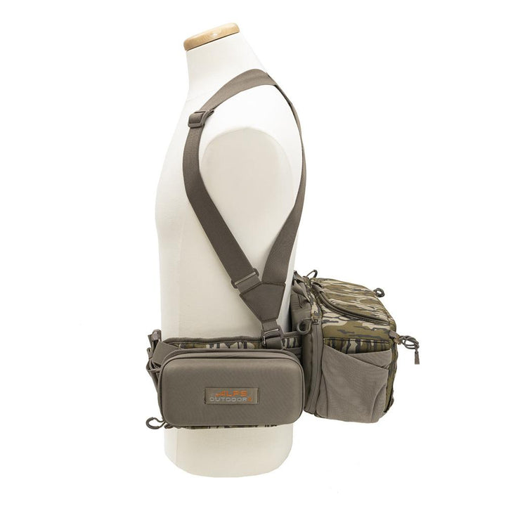 Chattanooga Alps Outdoorz Turkey Tracker Waist Pack in Mossy Oak Bottomland, durable and comfortable for outdoor hunting activities.