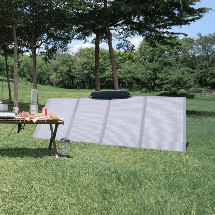 EcoFlow DELTA Pro portable power station with extra battery and 400W solar panel, 3600Wh capacity for outdoor energy needs.