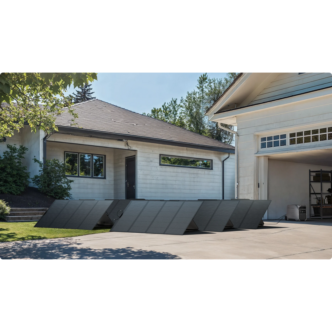 EcoFlow DELTA Pro 3 and Solar Panel Set set up in a residential driveway with solar panels positioned for optimal sunlight.