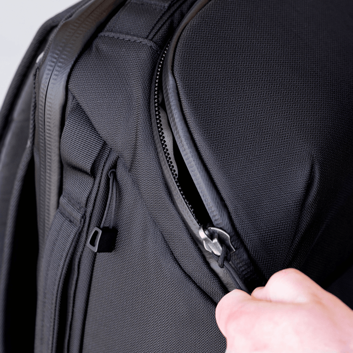 Faraday Backpack made of CORDURA fabric, 35L capacity, no logos, measuring 13x11x9.75 inches, designed for durability and style.