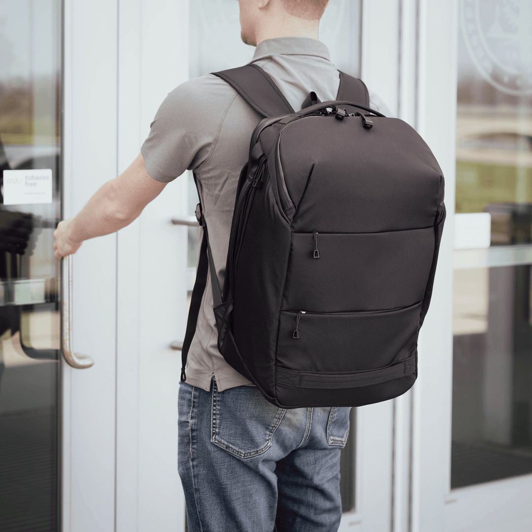 Faraday Backpack in CORDURA fabric with no logos, 13x11x9.75 inches, durable outdoor hiking and travel backpack.