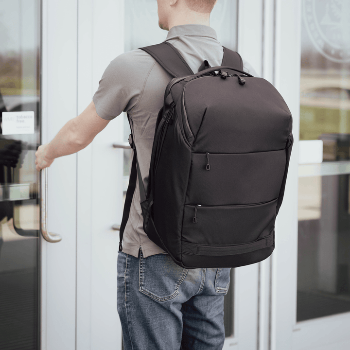Faraday Backpack in CORDURA fabric with no logos, 13x11x9.75 inches, durable outdoor hiking and travel backpack.