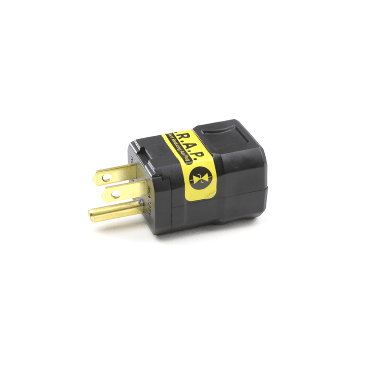 Faraday T.R.A.P AC transient voltage suppression device attached to an electrical plug for surge protection.