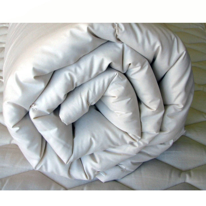 Holy Lamb Organic Wool Comforter in light twin size, 68 x 86 inches, showing plush, natural wool filling and soft fabric cover.