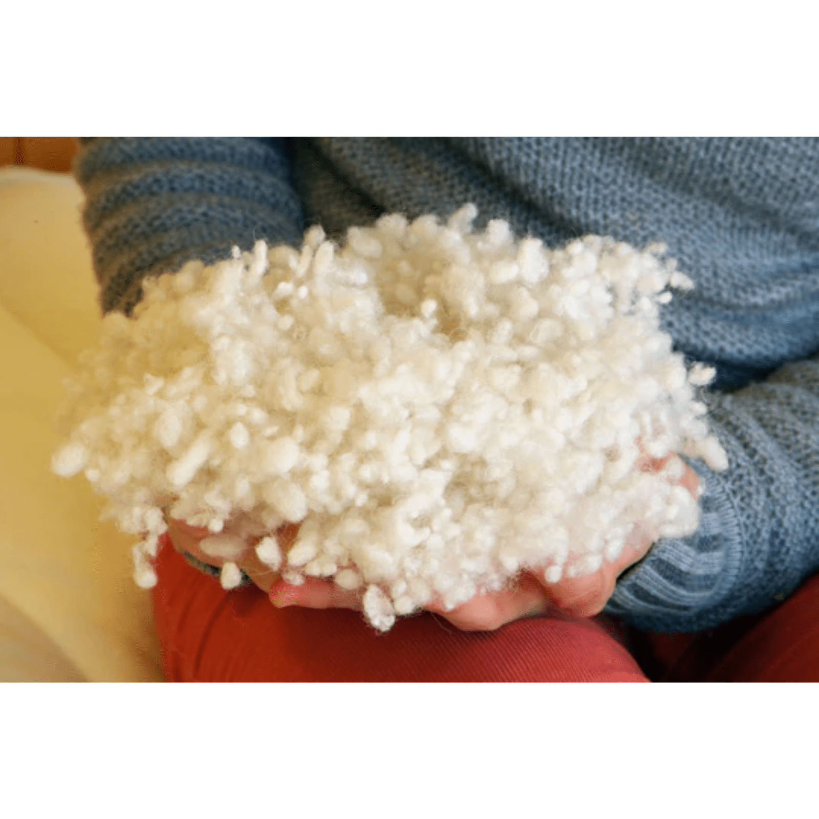 Holy Lamb Organics child's bed pillow in natural fabric, soft, customizable, measuring 12.5 by 17.5 inches, with plush filling.