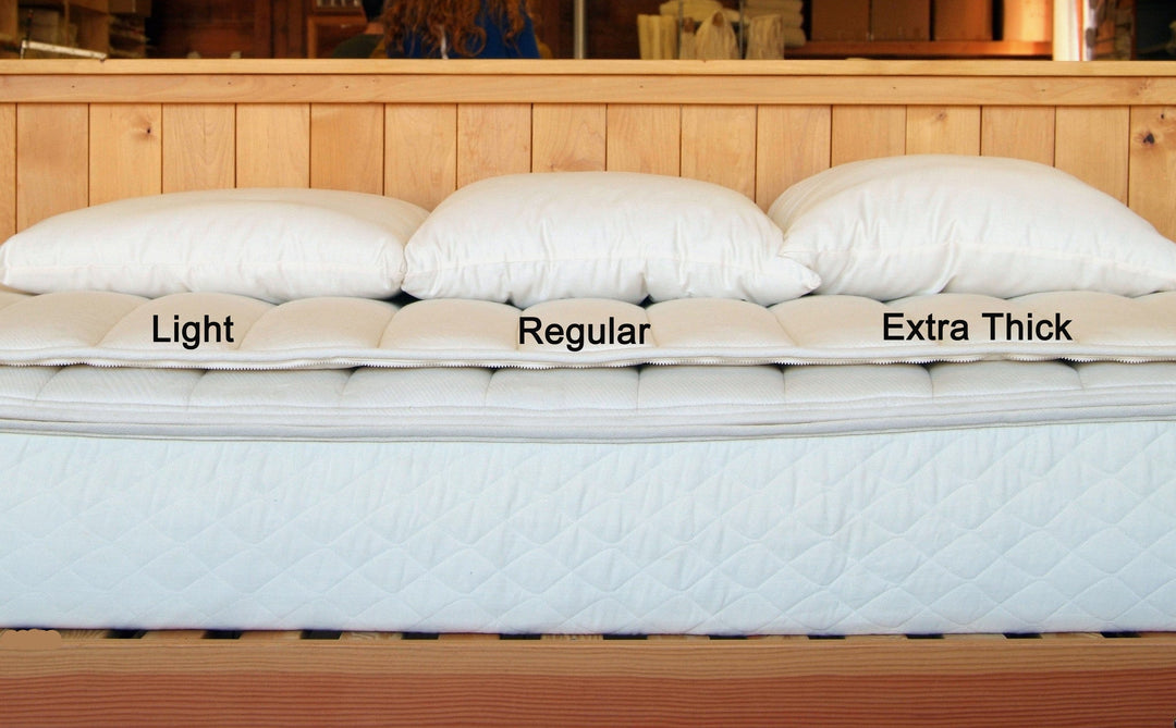 Holy Lamb Organics wool-filled king-size bed pillow, extra thick, 20x36 inches, showcasing soft, plush filling and durable fabric.
