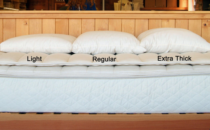 Holy Lamb Organics wool-filled king-size bed pillow, extra thick, 20x36 inches, showcasing soft, plush filling and durable fabric.