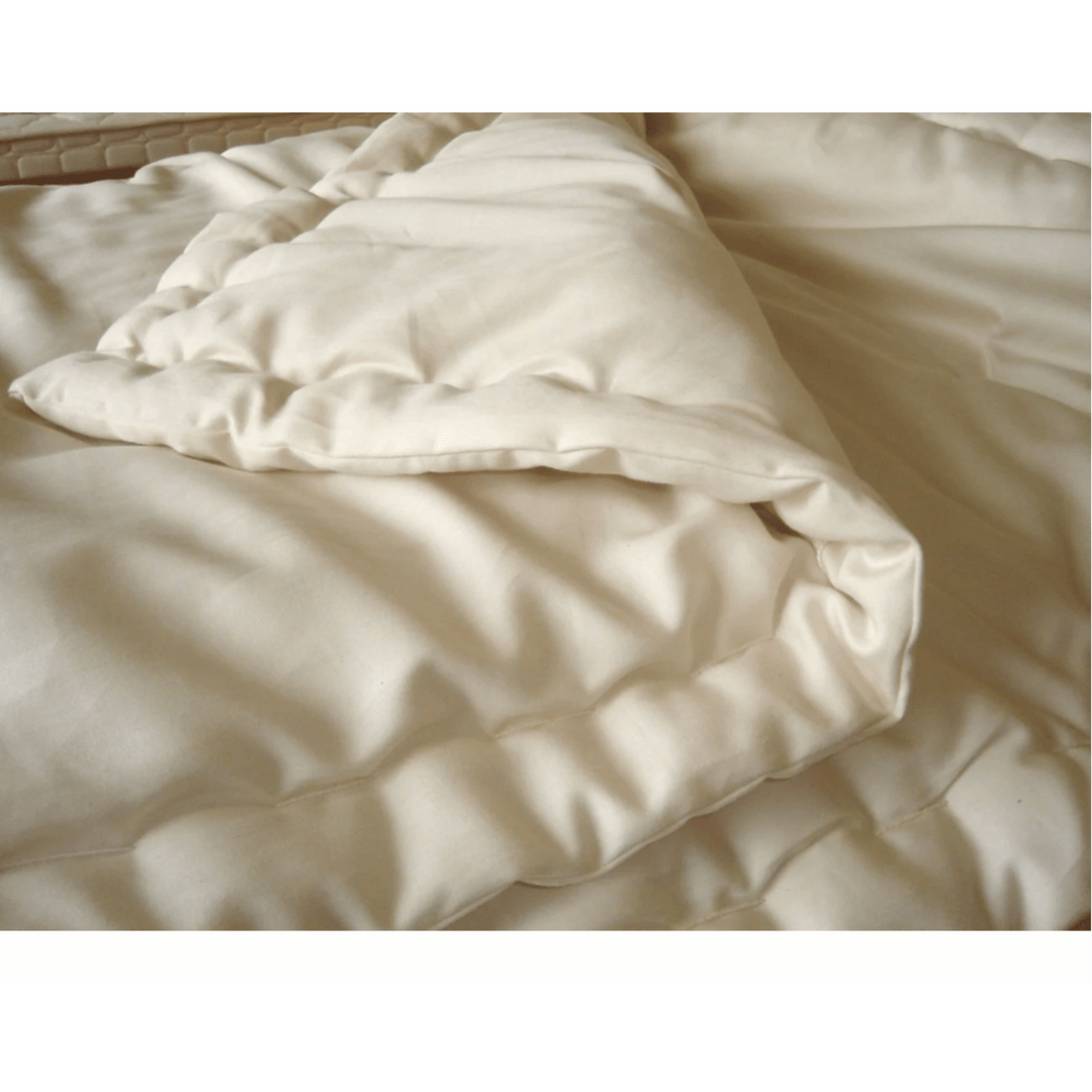 Holy Lamb Wool Comforter in queen size, lightweight and cool, made from natural wool for comfortable sleep.