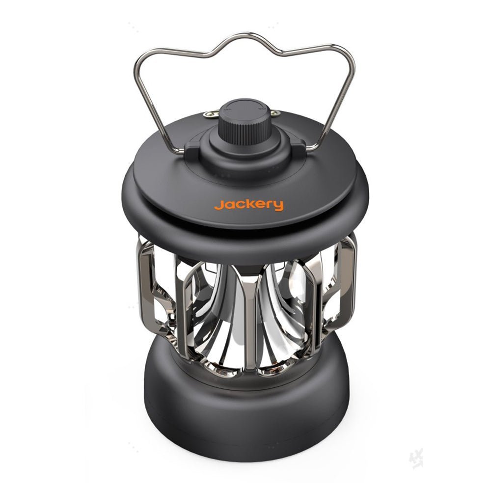 Jackery camping lantern emitting bright light, portable outdoor camping lantern with handle and adjustable brightness.