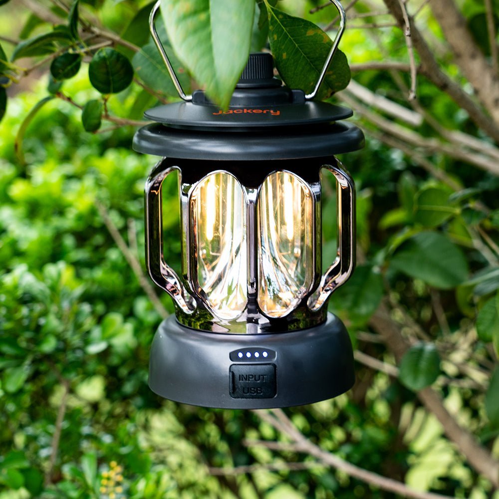Jackery camping lantern showing its bright LED light and portable design ideal for outdoor camping and outdoor activities.