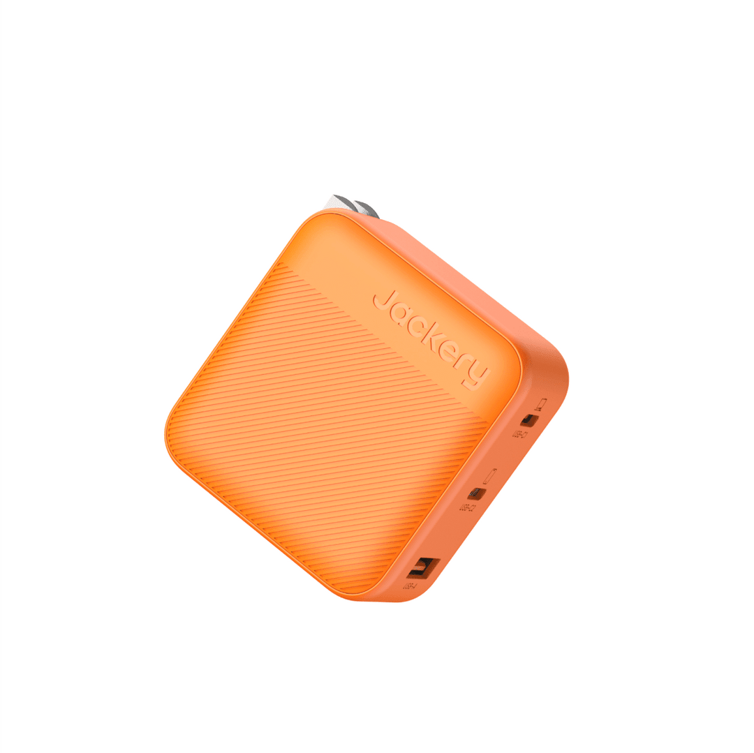 Jackery 102W GaN 3-port fast charger with compact design and multiple USB charging ports.