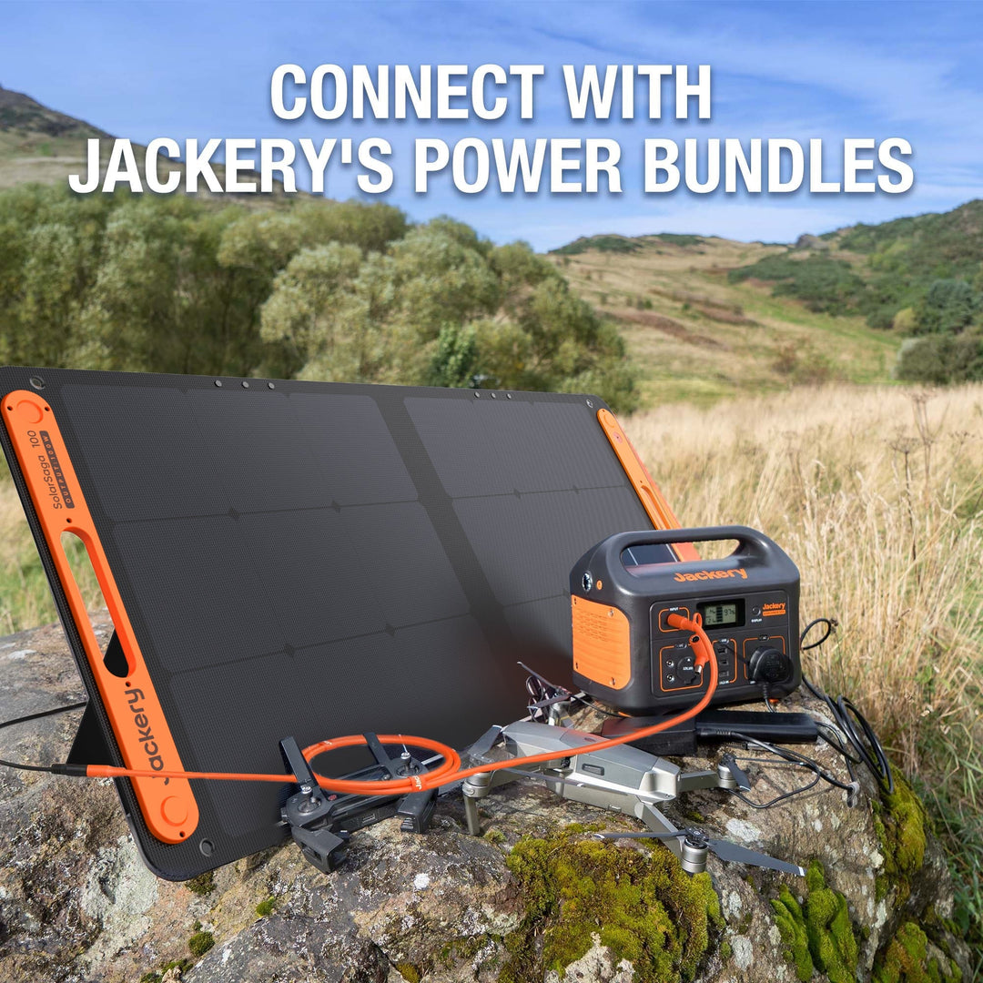 Jackery DC extension cable for solar panel, black, with connectors at both ends, used for extending solar power setup.