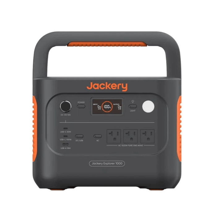 Jackery Explorer 1000v2 portable power station with 1070Wh capacity, shown in a natural outdoor setting with multiple outlets and display panel.