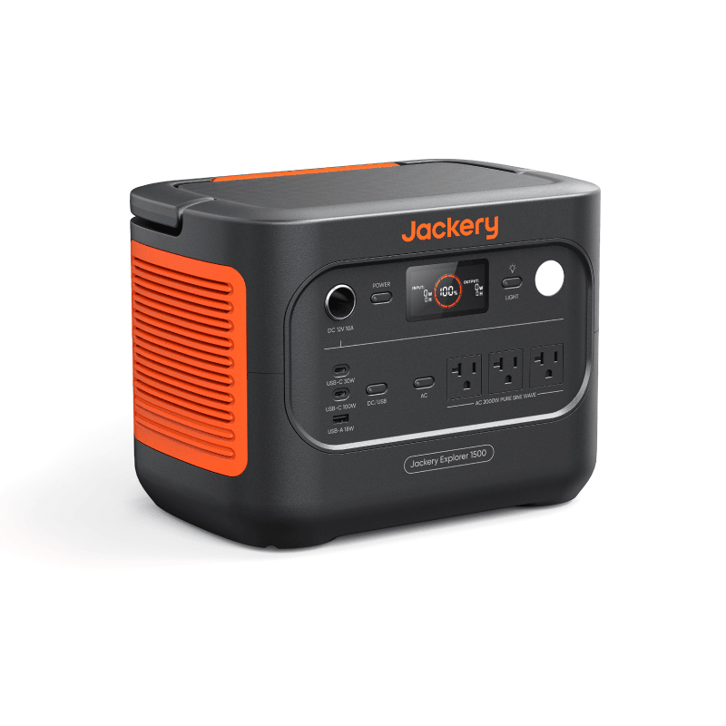 Jackery Explorer 1500 V2 portable power station with 1536Wh capacity and two 100W solar panels for outdoor energy charging.