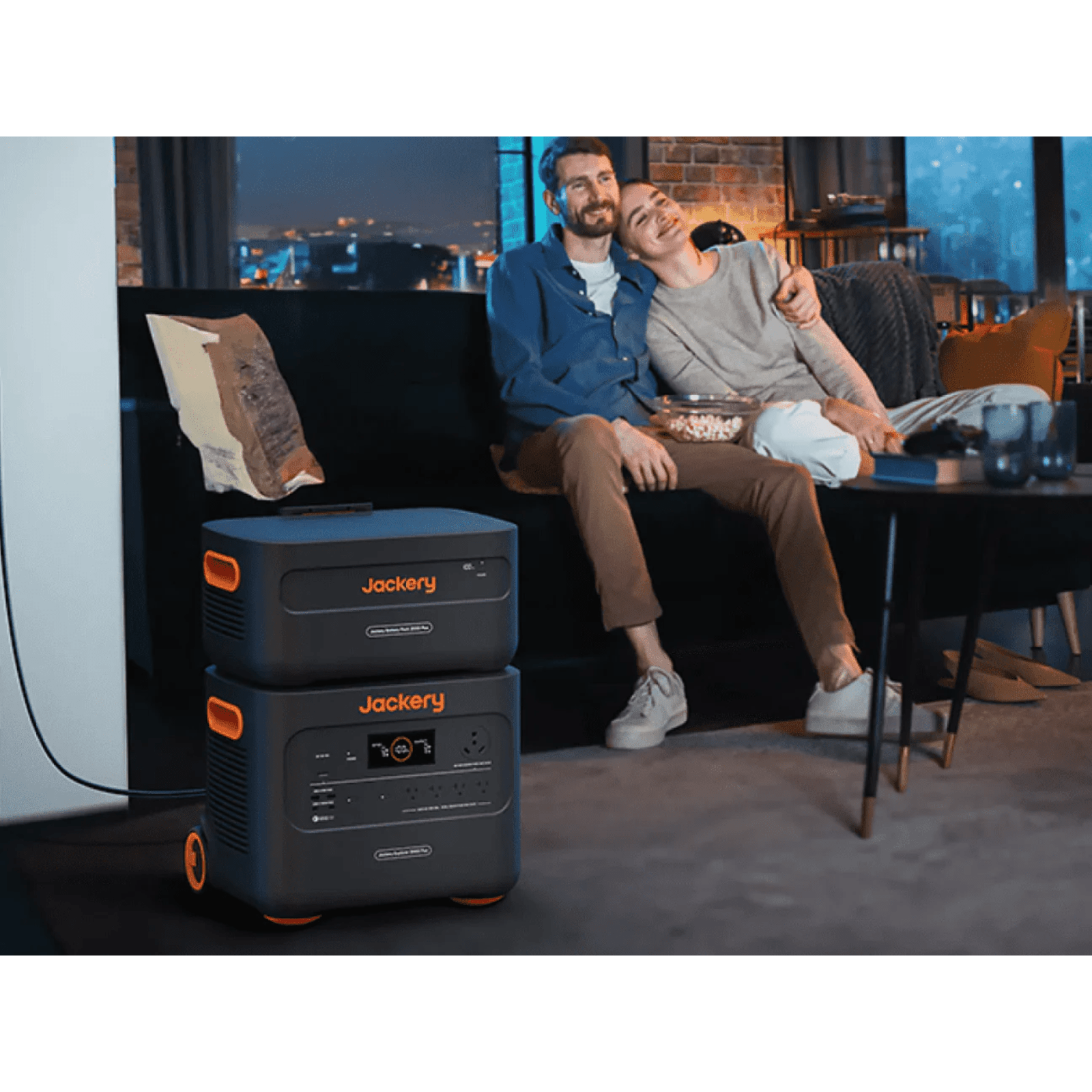 Jackery Explorer 2000 Plus portable power station with E2000Plus battery, showing multiple charging ports and digital display.