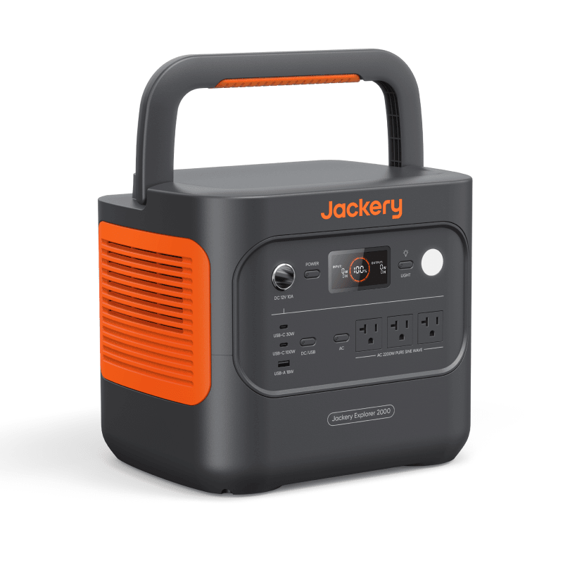 Jackery Explorer 2000 V2 portable power station with 2042Wh capacity and two SolarSaga 200W solar panels for outdoor power.
