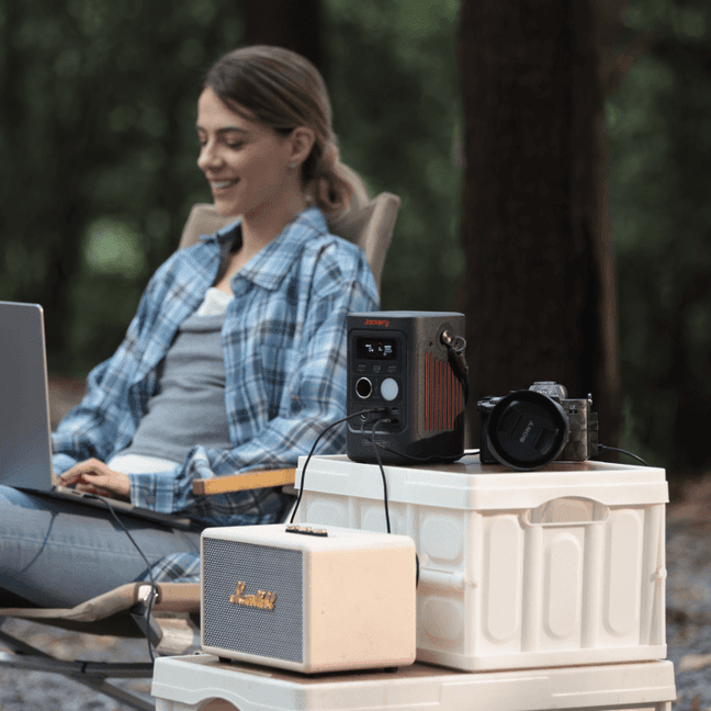 Jackery Explorer 300D portable power station with SolarSaga 40W solar panel, showing the compact power device and solar panel setup.
