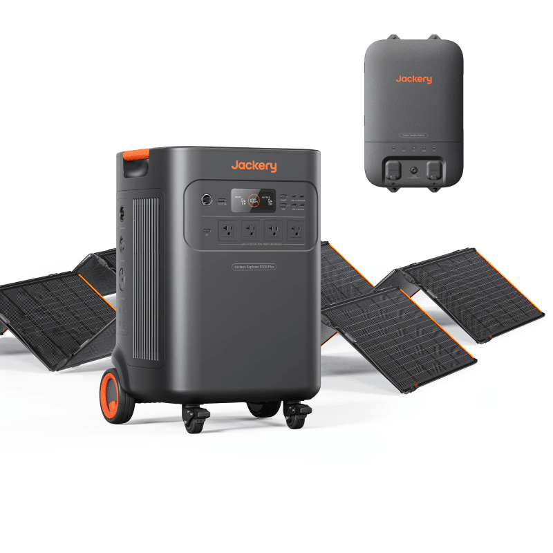 Jackery Explorer 5000 Plus portable solar generator with two SolarSaga 500 X panels and transfer switch for outdoor power.