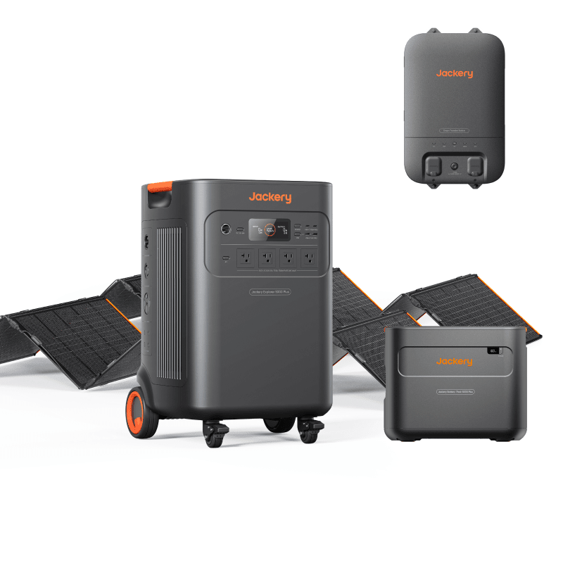 Jackery Explorer 5000 Plus portable solar power station with two SolarSaga 500 X panels and transfer switch for outdoor energy.