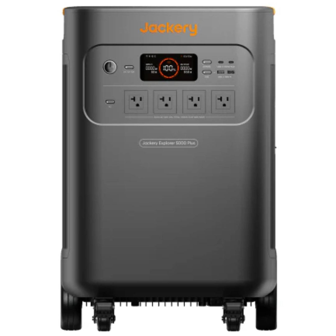 Jackery Whole-Home Backup Kit 5000 Plus portable power station with multiple outlets and digital display showing battery status.
